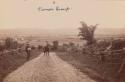 Two men on road going towards Turner group.