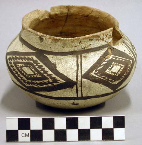 Ceramic jar, straight neck, brown on white exterior, sherd missing