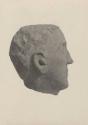 Profile view of stone sculpture found by farmer.