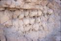 Small, round adobe bricks at Huaca Santo Domingo, Moche Valley