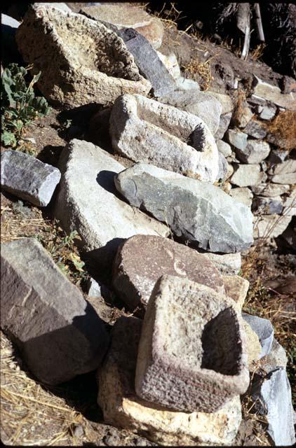 A group of basin metates at the site of Karapaico (U9563), Moche Valley