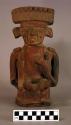 Earthenware effigy figurine with modeled and carved features