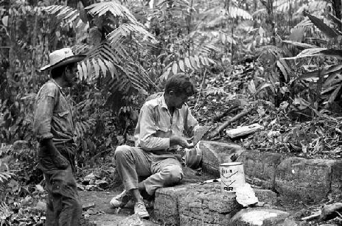 Ian Graham epoxying fragments of Structure 5 at Yaxchilan