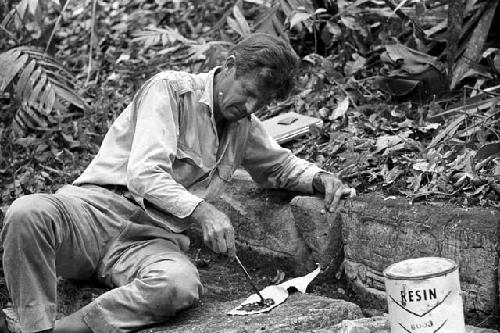 Ian Graham epoxying fragments of Structure 5 at Yaxchilan