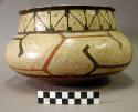 Ceramic vessel, polychrome, flared rim, flat base.