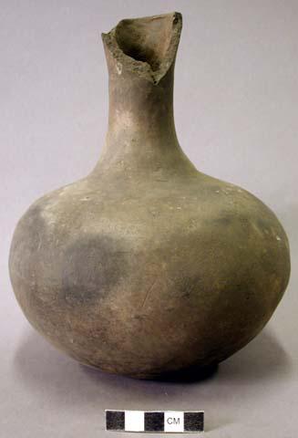 Ceramic vessels, complete, long neck, broken at rim.