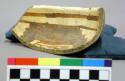 Fragment of pottery bowl. Jeddito black-on-yellow