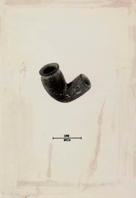 Stone pipe, stem and bowl decorated with incised lines