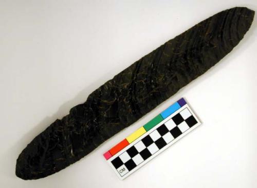 Chipped implement; chipped from black obsidian