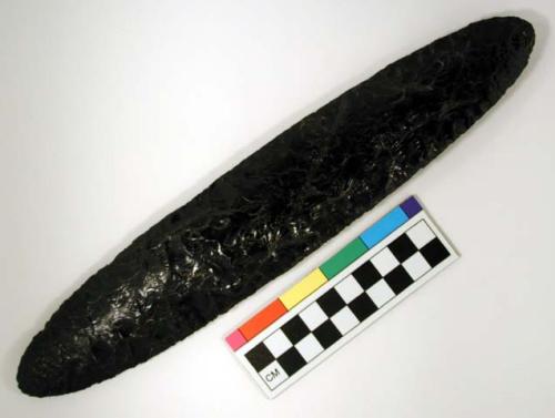 Chipped implement; chipped from black obsidian