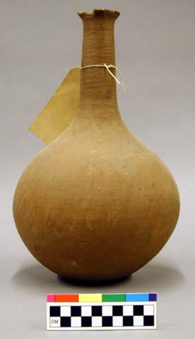 Ceramic bottle, long neck, flared rim, plain.