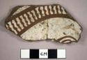 Mangus black-on-white potsherd