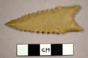 Cast, projectile point, serrated, lanceolate