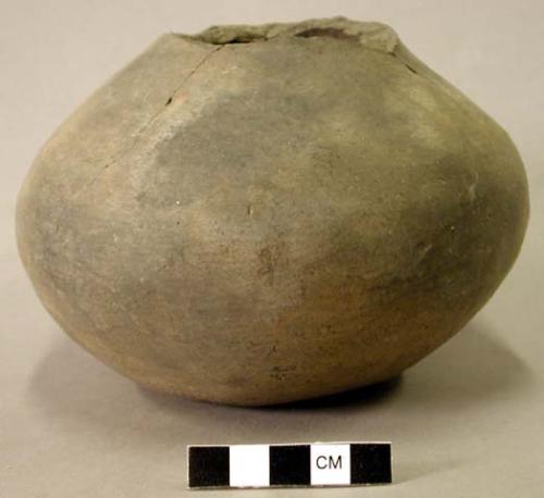 Ceramic complete vessel, broken at neck, plain