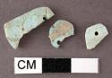 Fragments of turquoise pendants, all with single perforation - size range: 1.4 x