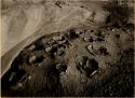 Round pits in Basketmaker cave; Heye Museum Expedition