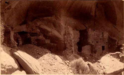 Cliff houses built under overhanging ledges