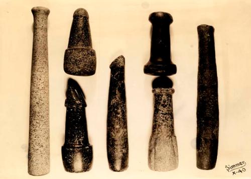 Long narrow pieces with knob. From old camp site of Salish