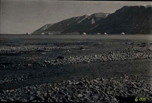 Rocky Shore. Members of Explorer's Club on expedition