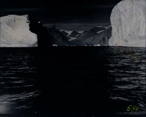 Large body of water. Members of Explorer's Club on expedition