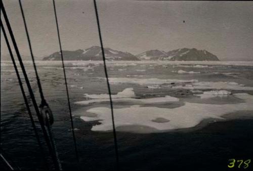 Shot from one side of ship. Members of Explorer's Club on expedition