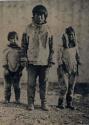 Inuit man with girl and boy