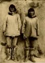 Two Inuit men wearing traditional clothing