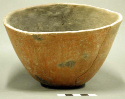 Bowl. outcurved-conical. round, somewhat flattened bottom. body repair. interior