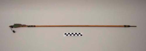 Long arrow with bamboo shaft, notched wooden head with rock point