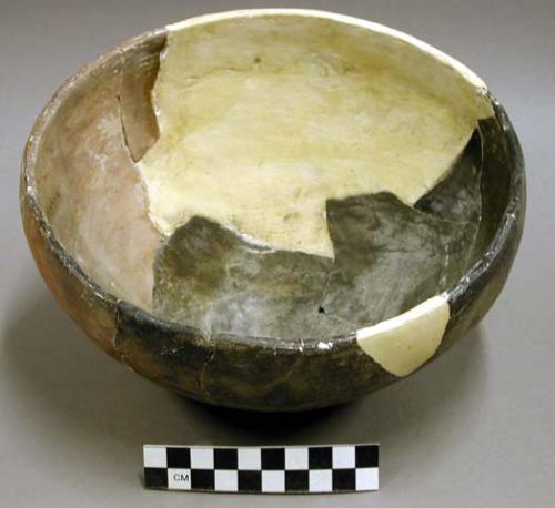 Restorable San Bernardino black-on-yellow pottery bowl