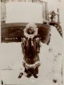 Inuit woman wearing fur parka