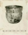 Pot showing combination of  incised figures