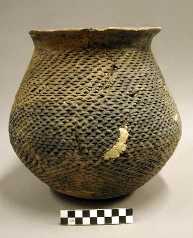 Corrugated jar, bottom missing