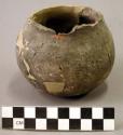 Small undecorated pottery jar