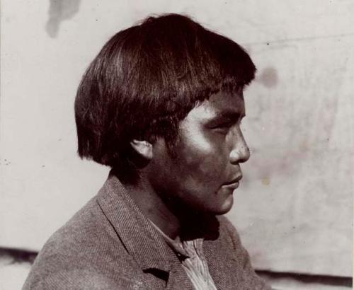 Profile of man (shoulders and up) with Western shirt and jacket