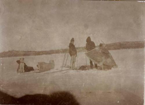 Tlicho people fishing in winter