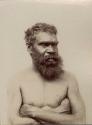 Portrait of an Aboriginal man, arms crossed