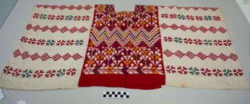 Huipil, woman's shirt, red and white with multicolored geometric designs