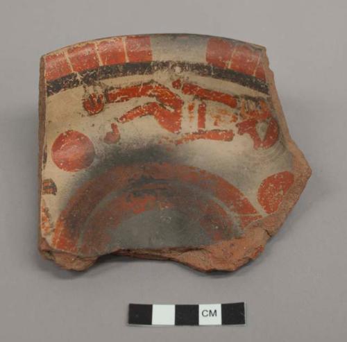 Polychrome pottery tripod rim fragment