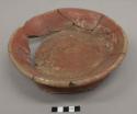 Red pottery bowl - broken