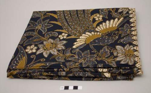 Batik textile, dark blue with ivory and tan vining floral and bird pattern