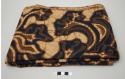 Batik textile; tan with dark blue and brown design