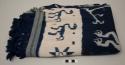 Indigo and white textile with ikat designs of animals, including horses; hinggi?
