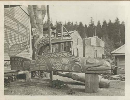 Fish effigy in front of chief's house