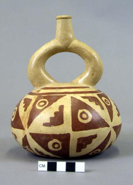 Pottery stirrup vessel