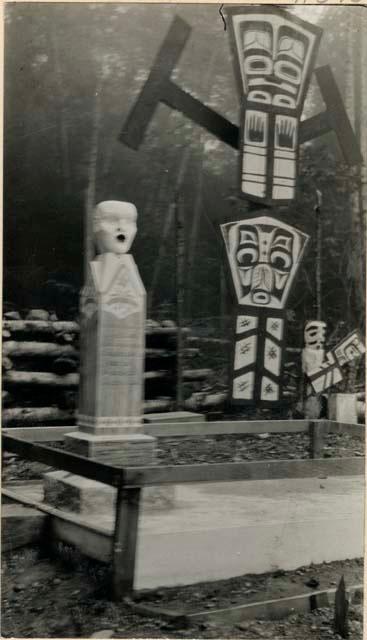 Painted board and stone funerary monument