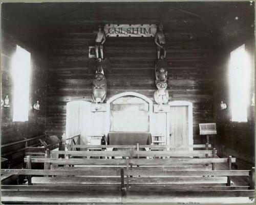 Interior of Indian School with totemic statues.