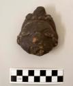 Anthropomorphic stone figurine head