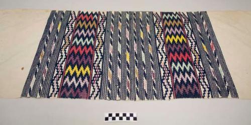 Half a huipil or a cofradia mantel, woman's shirt pannel or ritual altar cloth, white with indigo and multicolored geometric patterns