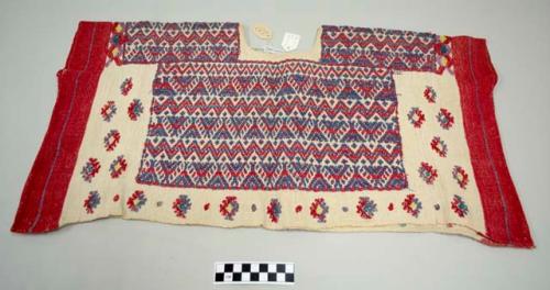 Huipil, woman's shirt, short, white with red borders and dense pink and light blue geometric designs around neck